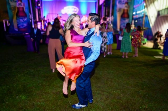 People dancing at Scales & Ales at Audubon Aquarium